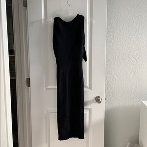 Super form fitting, sexy blck dress w/ unique back